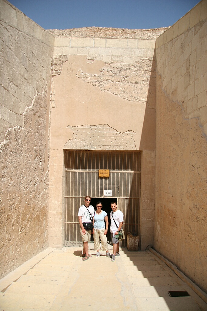 In front of an entrace to a tomb